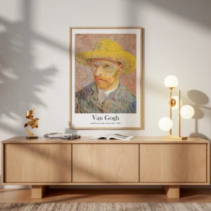 A print of Van Gogh's Self-Portrait with a Straw Hat (1887) hanging in a modern, light-filled living room over a blonde wood media console.